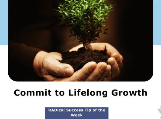 Hands holding rich soil nurturing a growing tree sapling, symbolizing the commitment to lifelong growth and development.